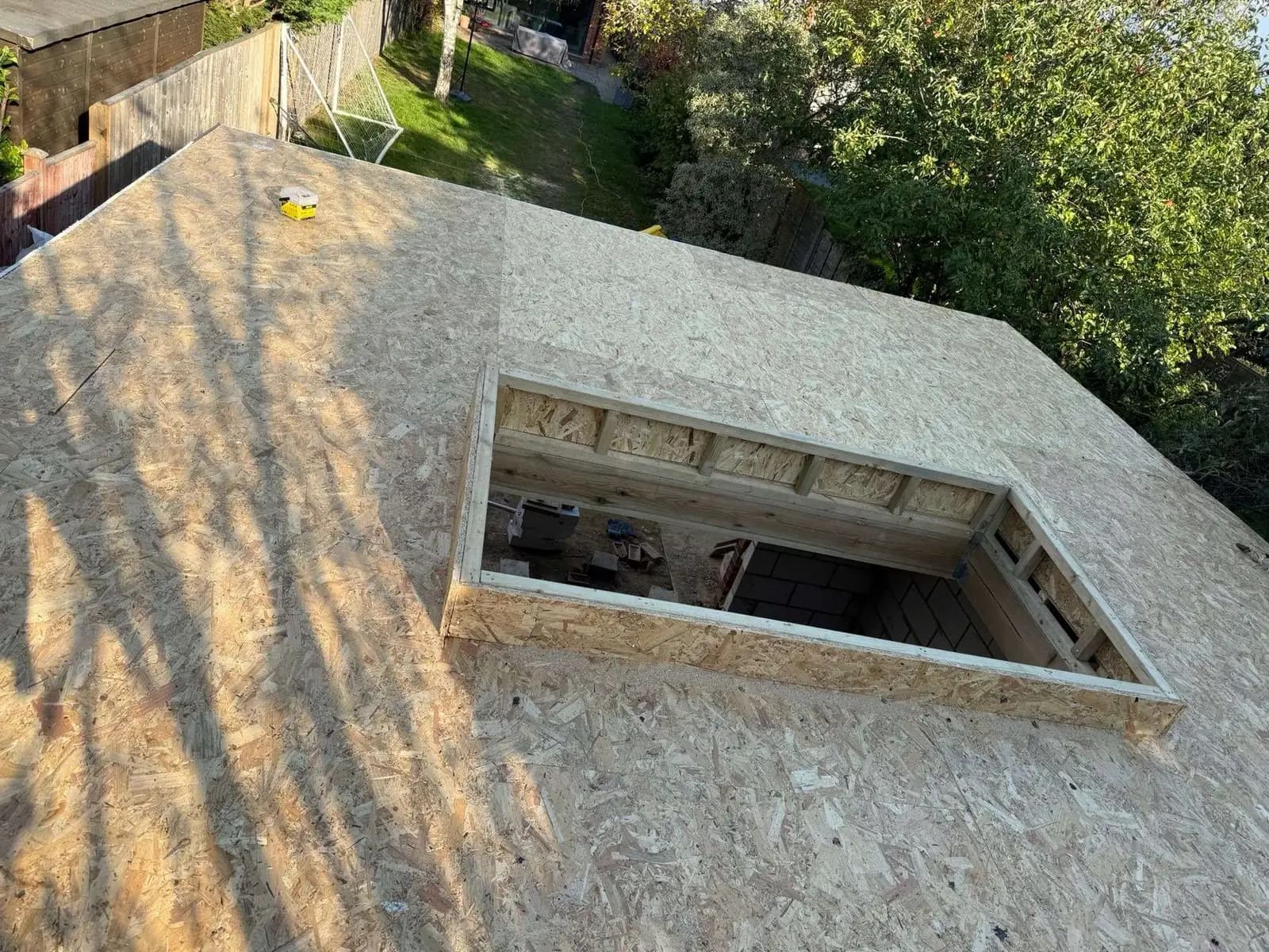 OSB flat roof deck.